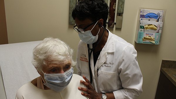 Dr. Carman Whiting sees a patient