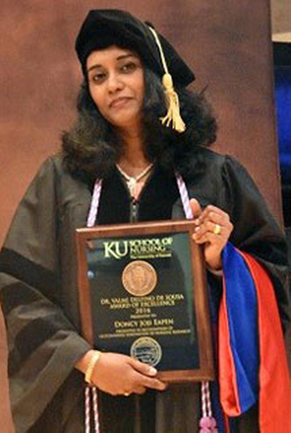 Dr. Eapen presented with the Dr. Valmi Delfino De Sousa Award of Excellence at KU School of Nursing’s commencement in May 2016.